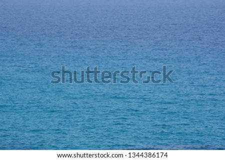 Blue  tones water waves surface as background
