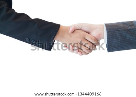 Young businessmen shaking hands to agree with lawyers within the lawyer office about investment laws and conduct business and discuss legal contract documents before signing a business contract.
