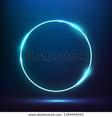 Glowing blue circle light effect. Vibrant round neon frame. Blue circular effect banner. Vector eps10 Royalty-Free Stock Photo #1344444443