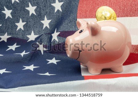Piggy Bank with golden Bitcoin on American Flag