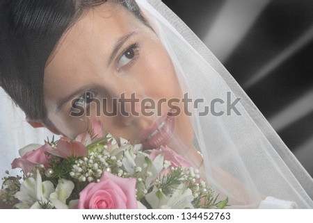 portrait of a beautiful bride with a bouquet of flowers