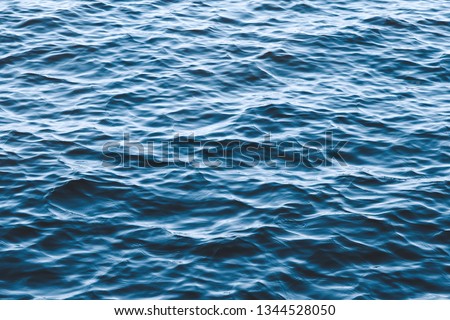 Sea waves texture. Blue rippled water surface.