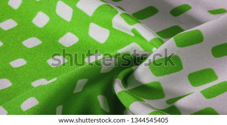 texture background pattern. Silk fabric with a pattern of green squares on a white background. This is a heavy square 100% polyester pattern that fits perfectly with modern, transitional or contempora