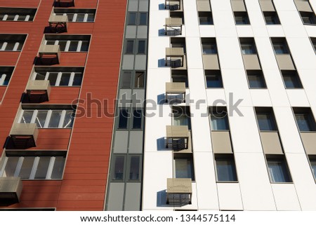 Modern new multi-storey residential building. business card concept