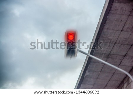 Red traffic light is overrun Royalty-Free Stock Photo #1344606092