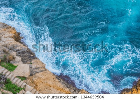 Clear blue sea and rocks