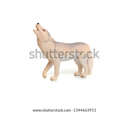 Toy wolf isolated on white background.