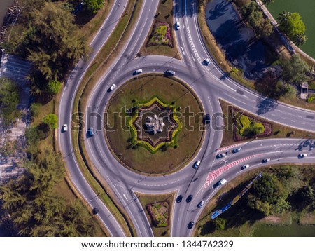 Aerial Drone Image of car moving at the big Round about at Kota Kinabalu City, Sabah, Malaysia