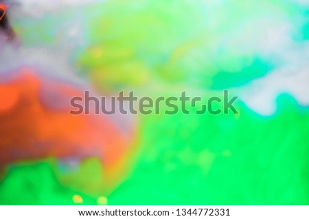 Motion Color drop in water,Ink swirling in water,Colorful ink in water abstraction.Fancy Dream Cloud of ink in water soft focus 