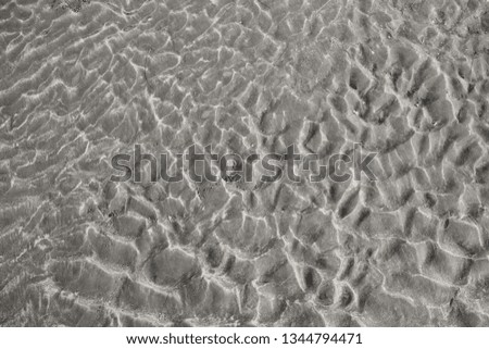 Waves on the sand