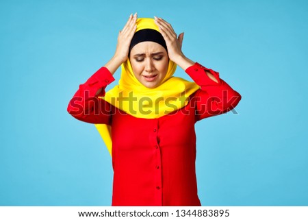 sad woman holding her head