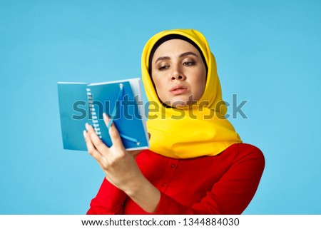  arab woman with notepad education                              