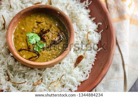 Stock Photo Red Lentil with boiled rice, traditional indian food