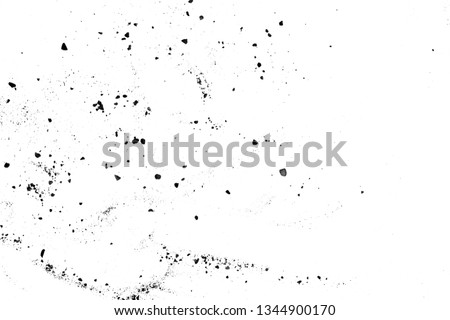 Black spots of dirt and dust on a white background, texture Royalty-Free Stock Photo #1344900170