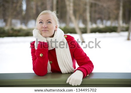 Woman relies at terrace boundary have happy thoughts