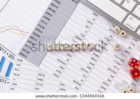 finance word on wood cube business content image.