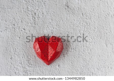 Red heart on white background. Greeting card. Valentines day concept. Soft focus. Close-up
