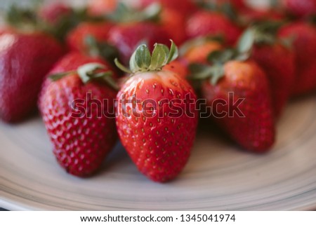 Strawberries background. Close up view of fresh and juicy strawberries as background. 