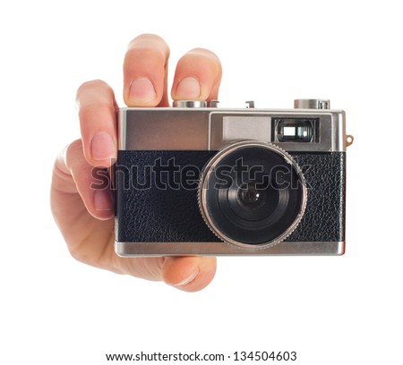Human Hand Holding Camera On White Background