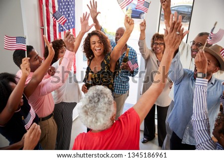 Three generation black family celebrating Independence Day together at home,elevated view