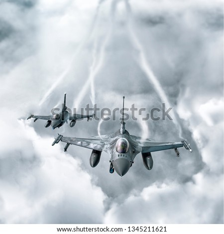 Two jets in sky Royalty-Free Stock Photo #1345211621