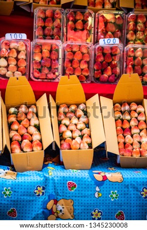 Strawberries in paper box, Thailand.