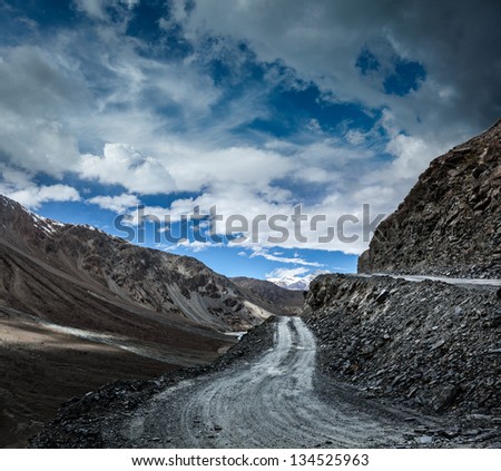 Dirt road in severe unpopulated Himalayas. Spiti valley,  Himachal Pradesh, India Royalty-Free Stock Photo #134525963