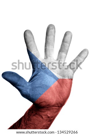 Low key picture of open hand painted in colors of czech flag