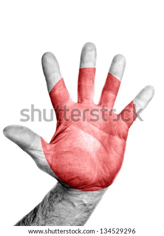 Low key picture of a open hand painted in colors of japan flag