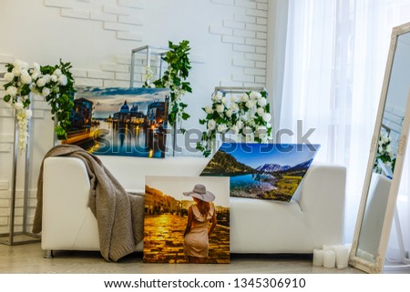 Modern lliving room interior with Cliffs of Moher canvas on the wall 