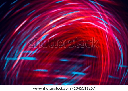 Abstract texture of parabolic lines of pink color, energy, magnetic field on a black background