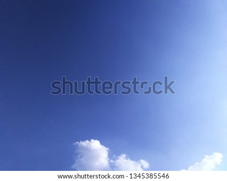 Blue and faded white sky with some clouds on sunset or sunrise time.Two tone sky for nature abstract background.