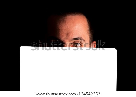 Man with blank space over his head. Shoot in low key technique