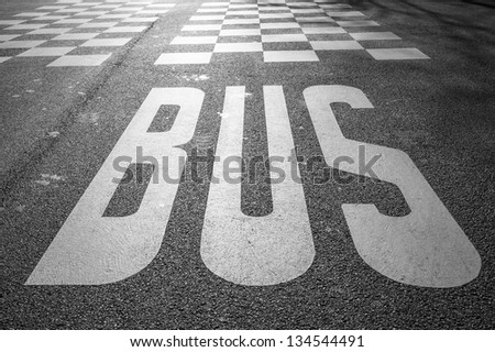 Bus sign on the road surface, Paris, France