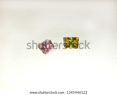 Image of pink and yellow zircons. Beautiful gemstone, natural gemstone. Image of pink and yellow zircons. Beautiful gemstone, natural gemstone