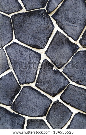 vintage black natural stone with white gaps