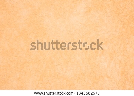 Photo picture of yellow eco leather. Close up of artificial leather. Big grain. Could be used as background.