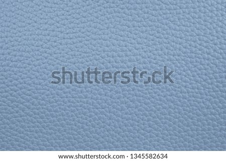 Photo picture of blue eco leather. Close up of artificial leather. Big grain. Could be used as background.
