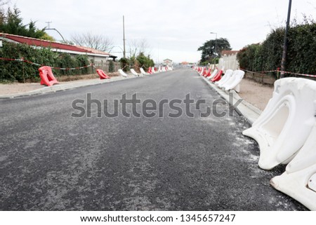 Road repair on street construction with cones 