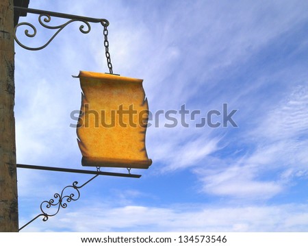 Signboard in retro style on a background of sky
