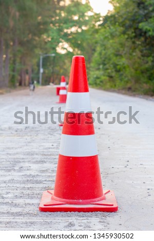 Traffic cones are placed on roads that are under construction.