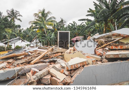 Destroyed House of earthquake disaster in Lombok, Indonesia – Standing Door – Meaningful picture – Image
 