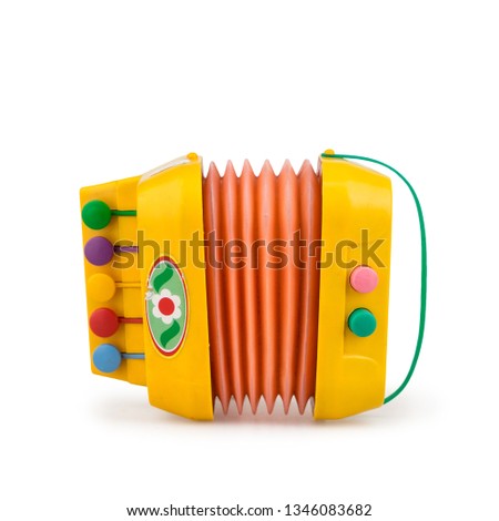Children's colorful toy accordion on a white background