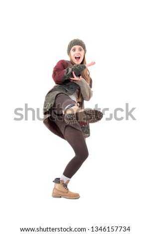 Cool funky playful comic girl kicking leg in karate style. Full body isolated on white background. 