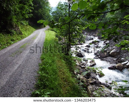 Jetzbach stream in the alpine valley of Im Loch - Canton of Glarus, Switzerland