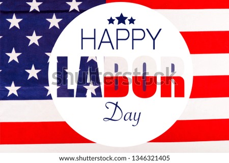 happy labor day lettering in white circle with stars on american flag 