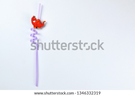Twisted drinking straw isolated on white