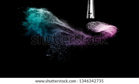 purple and blue ocean powder color splash and brush for makeup