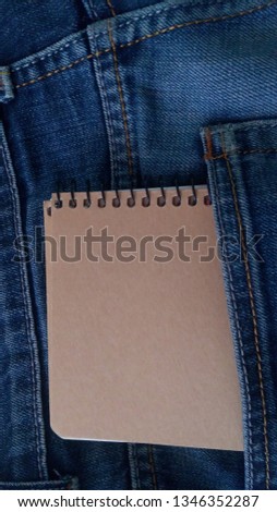 Wallet in jeans pocket