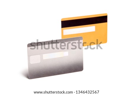 Silver and gold ATM or credit card template, isolated over white background